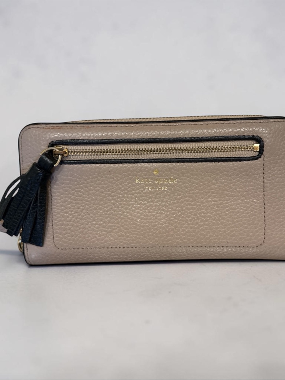 Kate Spade Pale Purple Pebbled Leather Zip Wallet with Black Tassel